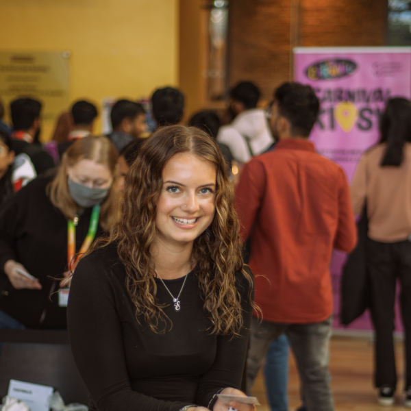 photo of female student smiling at camera