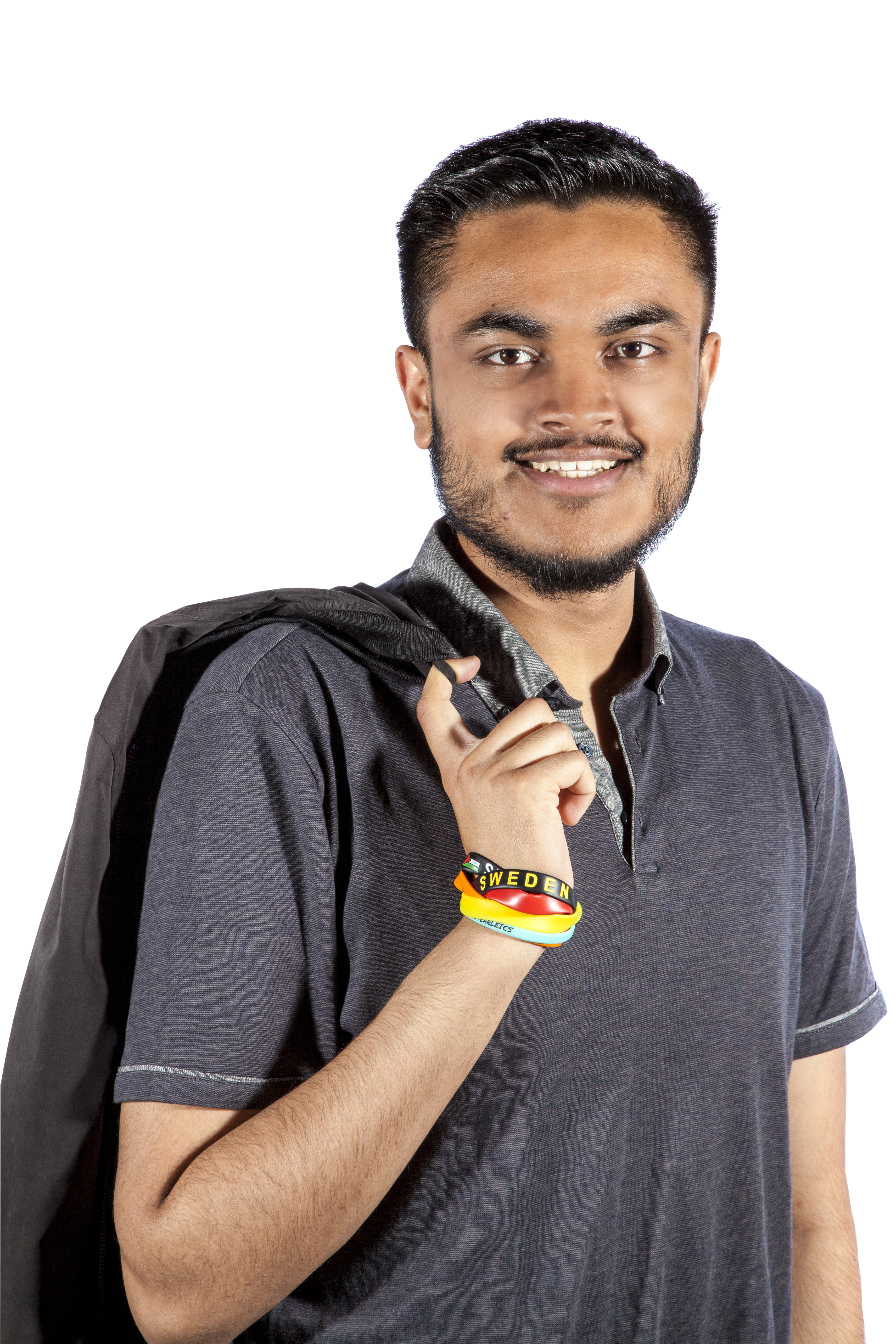 Photo an Adnan, an Indian man holding a jacket over his shoulder