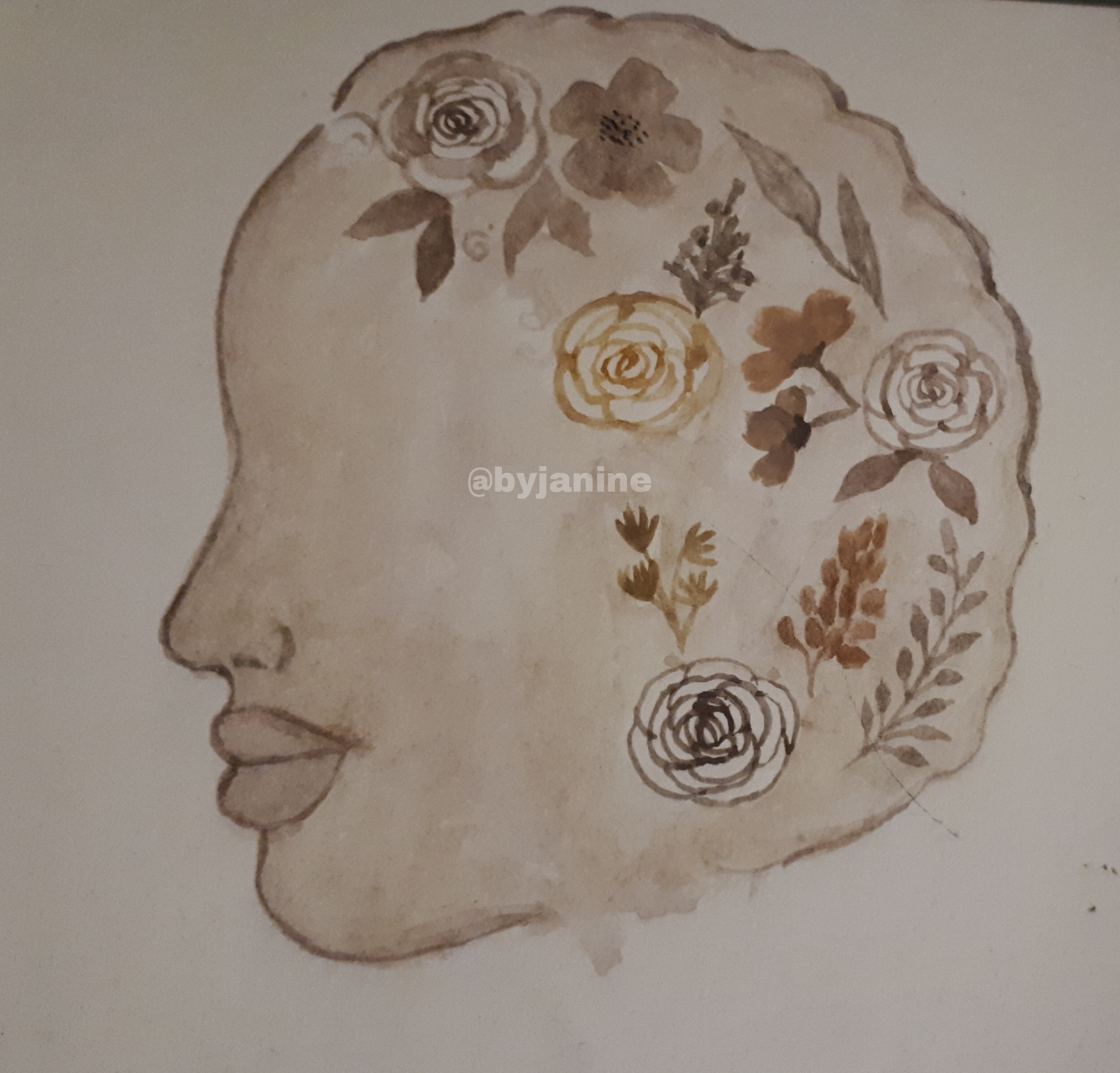 watercolour painting of a side silhouette with flowers in place of hair.