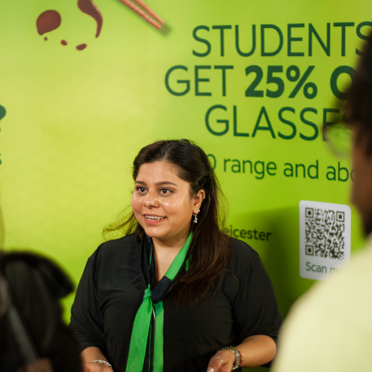 A women standing at a commercial stall