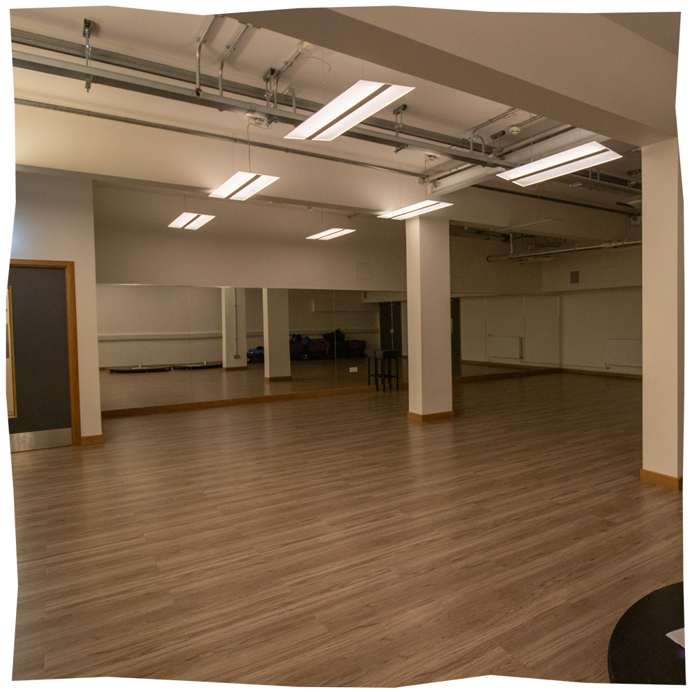 Dance studio, an open space with one wall of mirrors